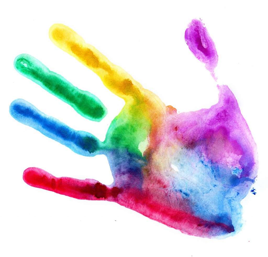 Close-up of colored hand print on white background